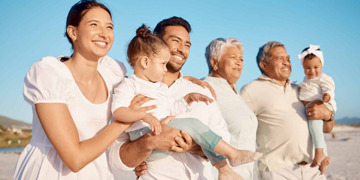 Shot of a multi-generational family spending time together at the beach.