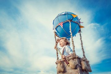 Little boy in a balloon outdoors